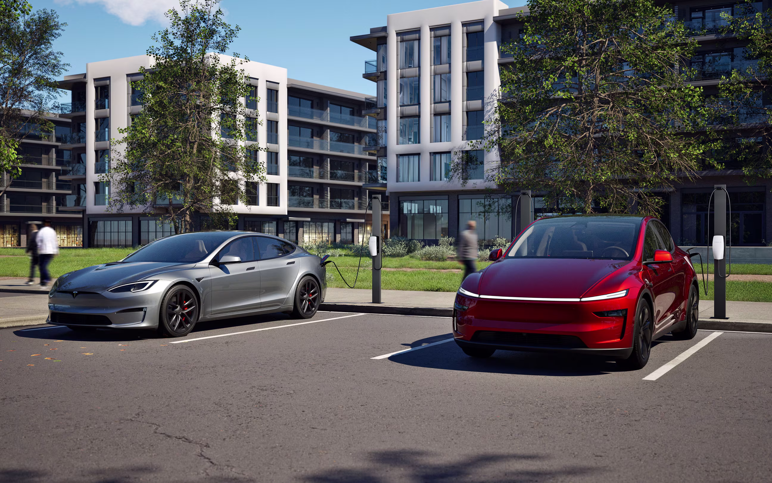 Otel otoparkında şarj edilen Tesla araçları